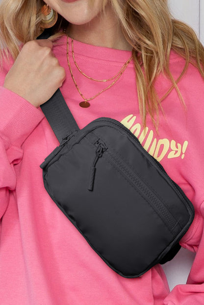 Sac bandoulière carré noir à large ceinture zippée