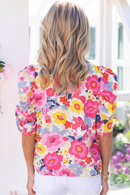 Blusa floral con mangas abullonadas fruncidas