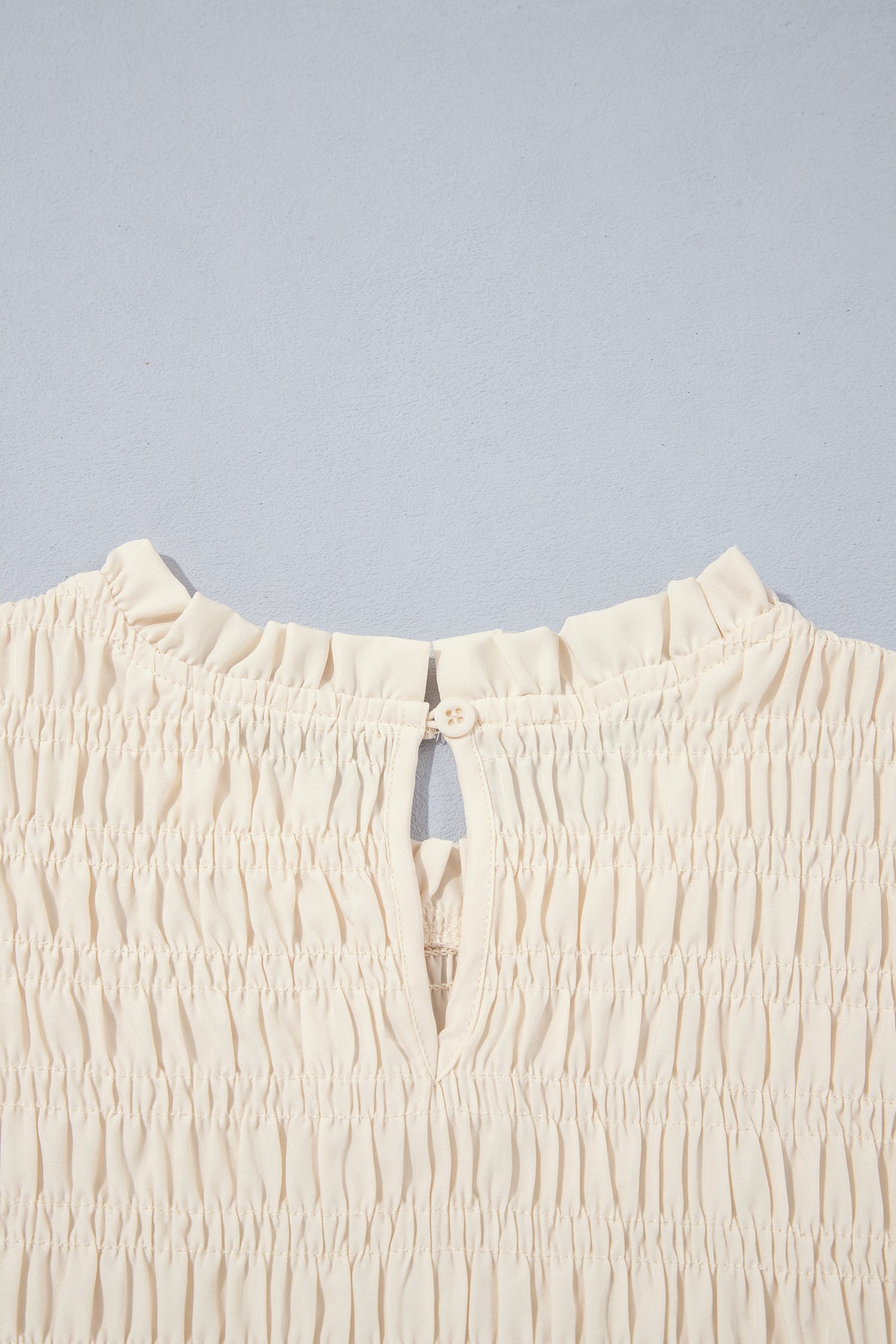 Jet Stream Solid Color Smocked Ruffle Hem Long Sleeve Blouse