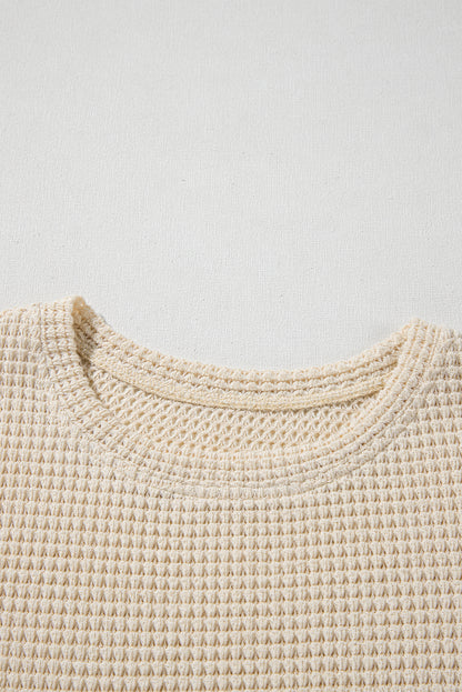 Chemisier péplum beige à imprimé floral gaufré et manches courtes à volants