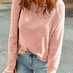 Haut texturé à manches longues et col rond rose abricot