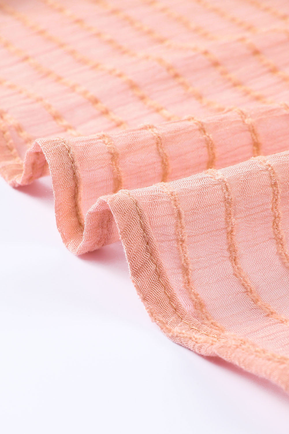 Chemisier péplum texturé noué sur le devant 