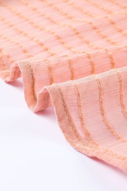 Chemisier péplum texturé noué sur le devant 