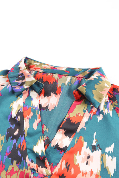 Blusa con mangas abullonadas y cuello en V con estampado de grafiti 