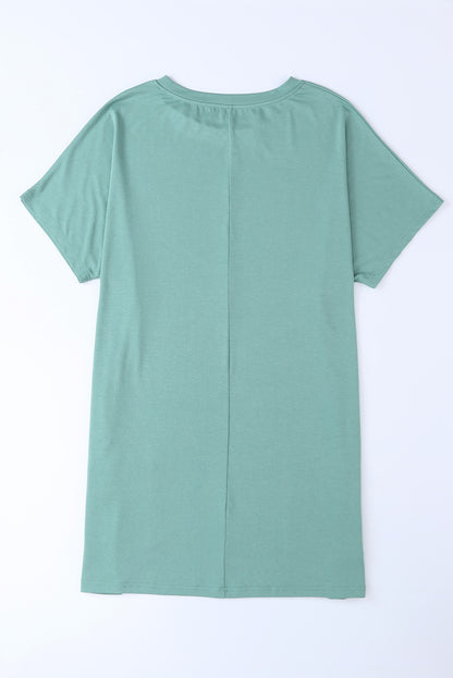 Tunique à manches courtes avec poches latérales 