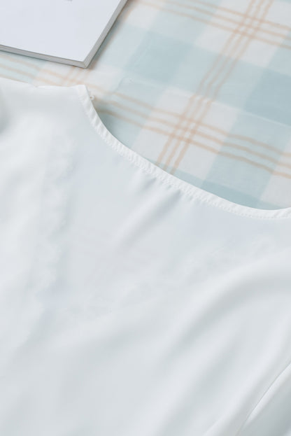 Chemisier à manches cloche et empiècements en crochet