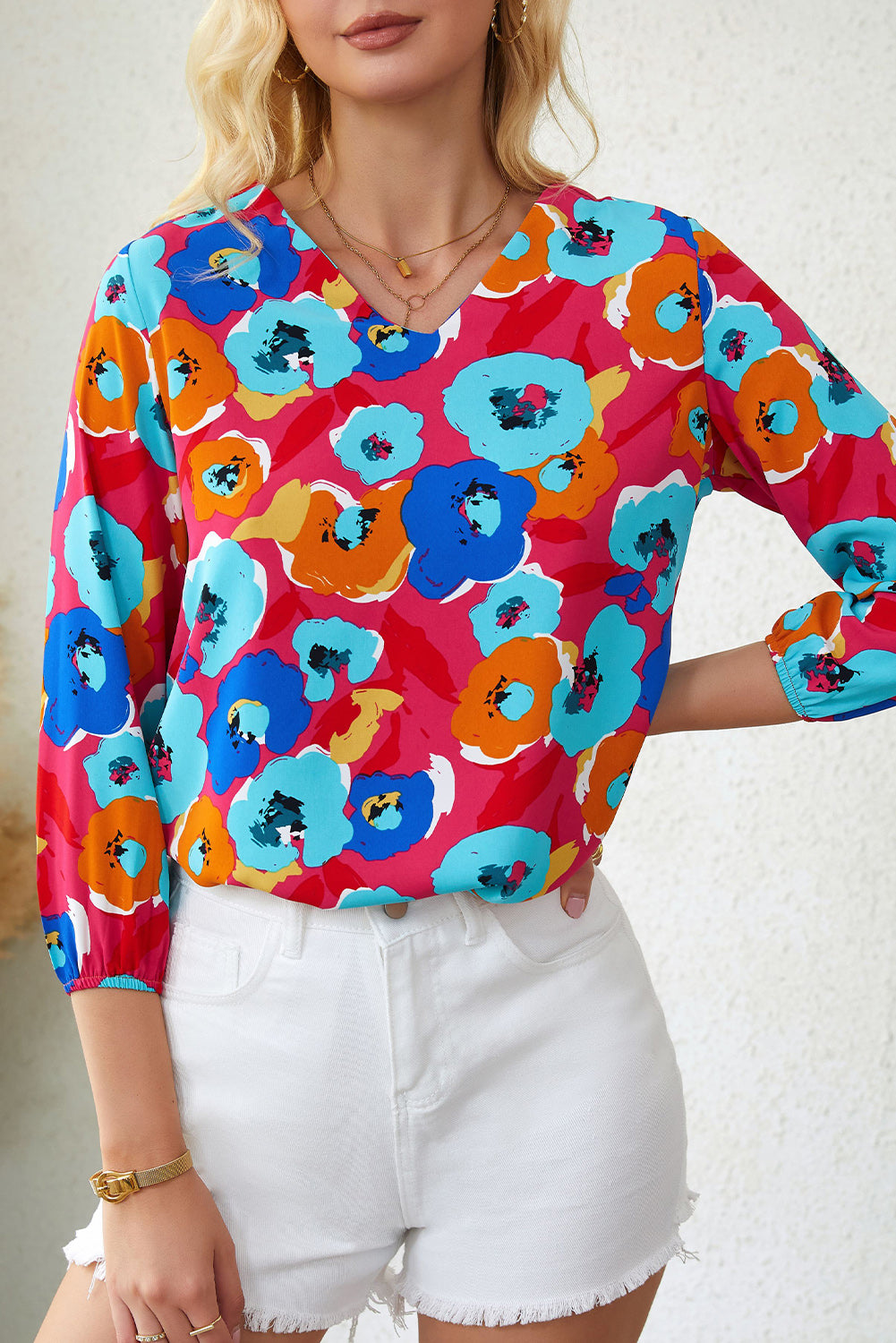 Blusa con cuello en V y manga 3/4 con estampado floral multicolor 