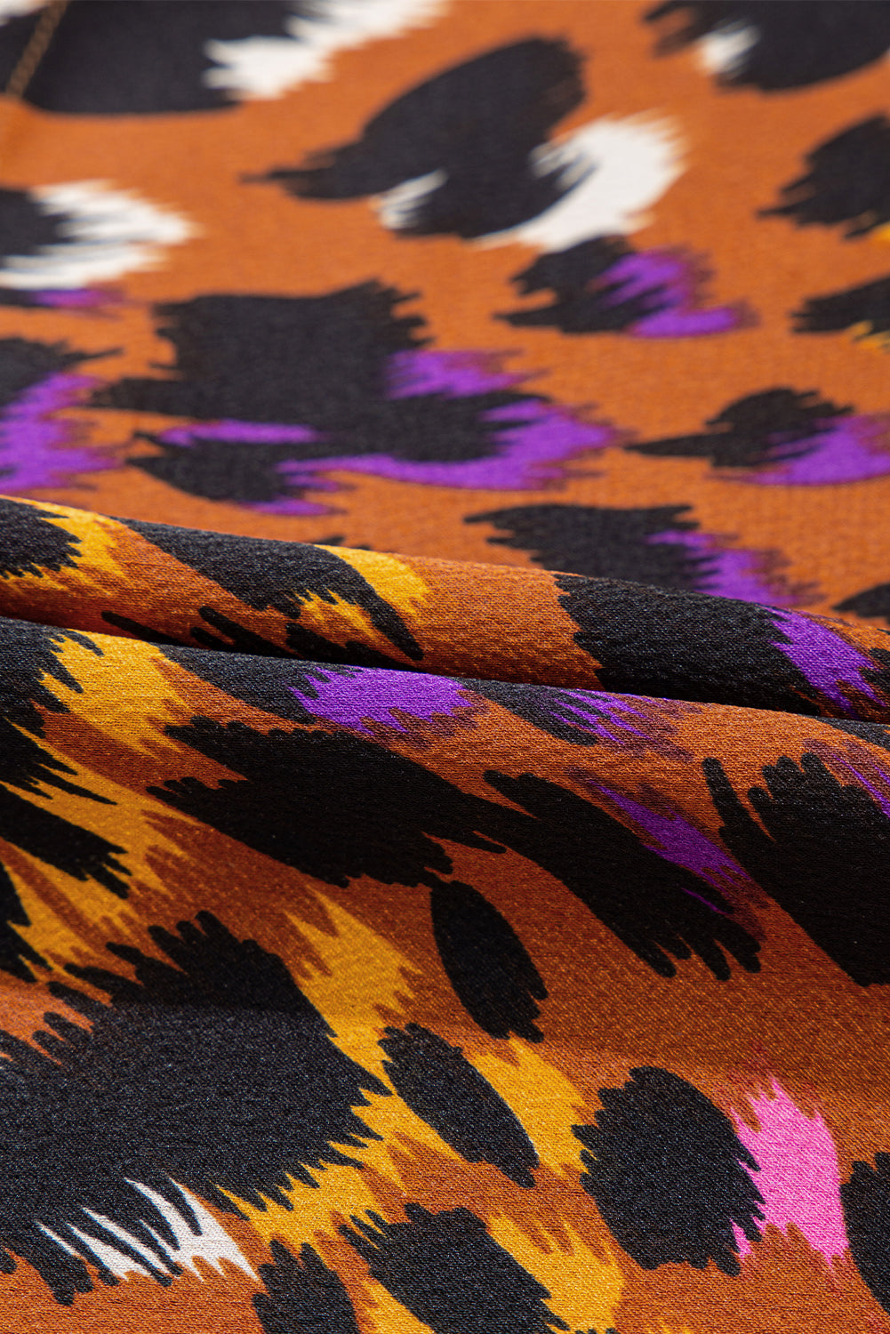 Chemisier orange à imprimé léopard, drapé, manches courtes, col en V fendu