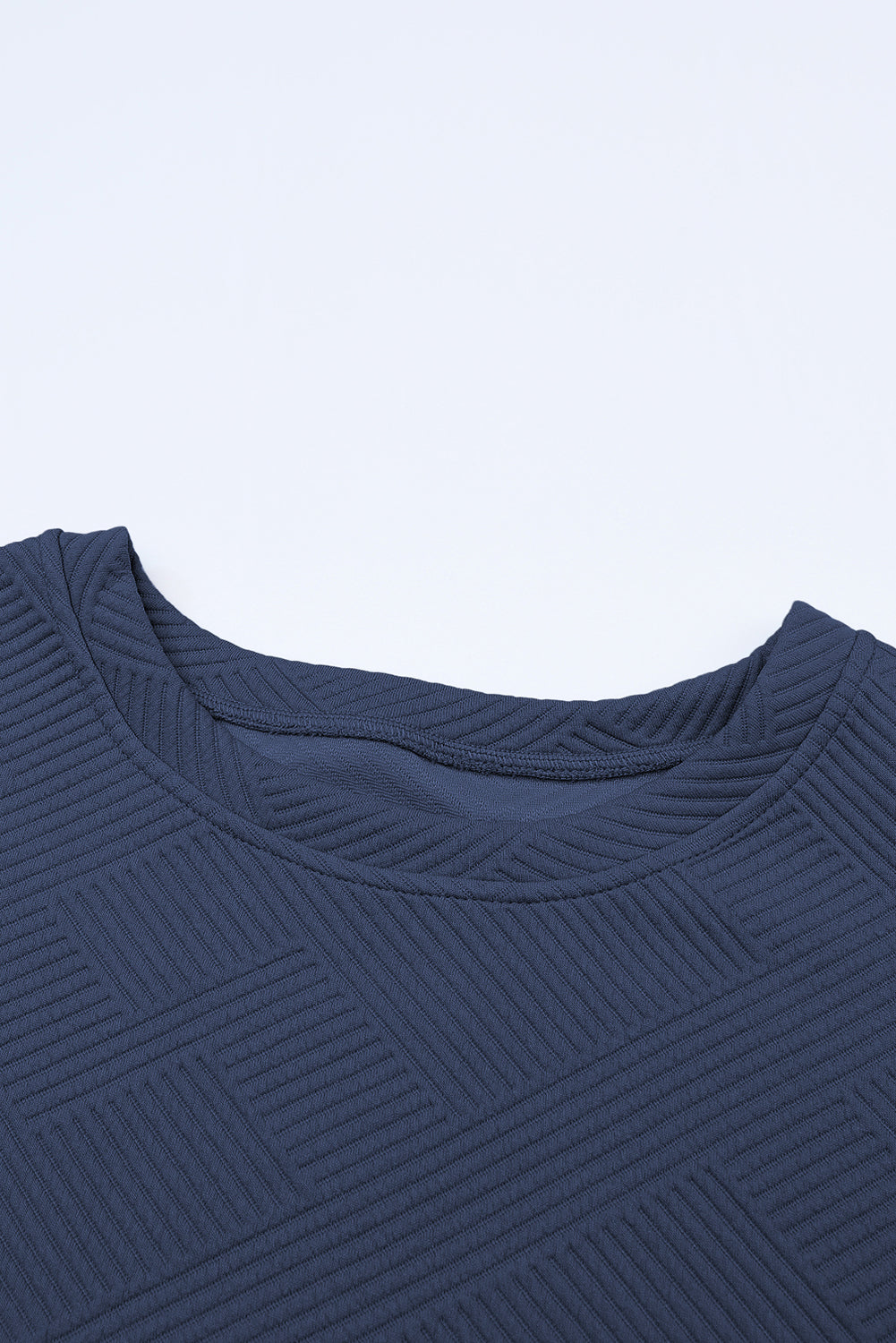 Conjunto de camiseta holgada con textura gris y pantalón con cordón