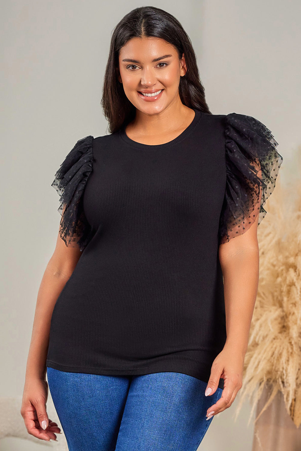 Haut en maille côtelée à volants et manches en maille à pois