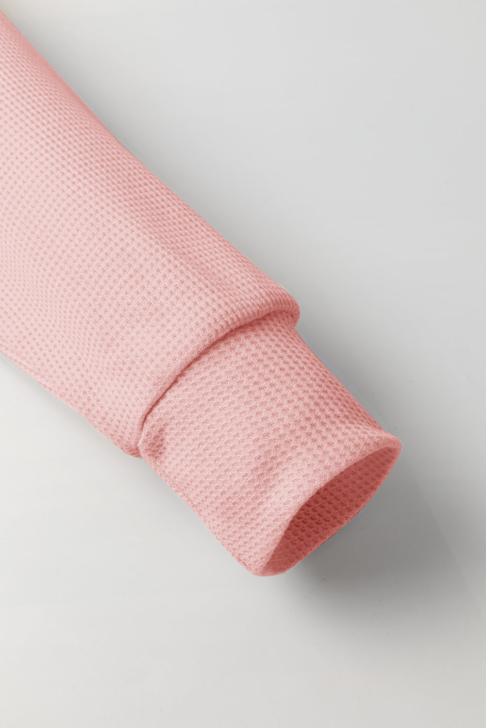 Sweat à capuche surdimensionné rose clair en tricot gaufré doublé polaire à col montant