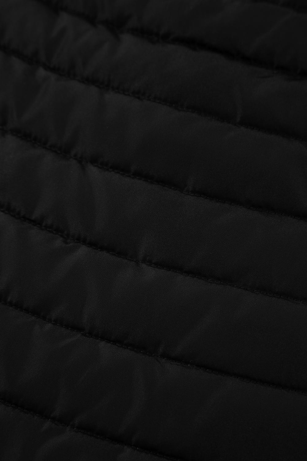 Gilet matelassé zippé à col en peluche noir