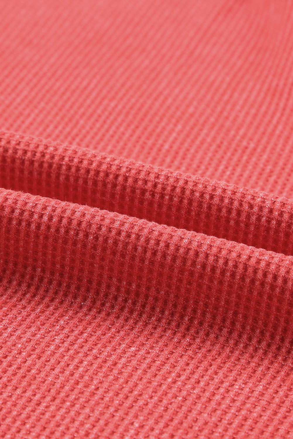 Top tipo jersey con abertura lateral y punto tipo gofre 