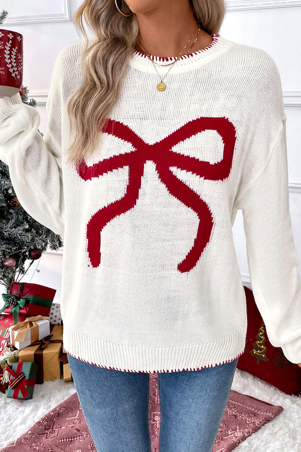 Pull graphique ample de Noël à motif de nœud blanc et bordure contrastée