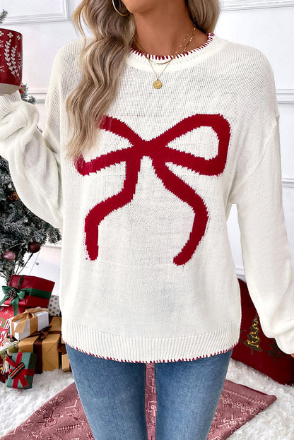 Pull graphique ample de Noël à motif de nœud blanc et bordure contrastée