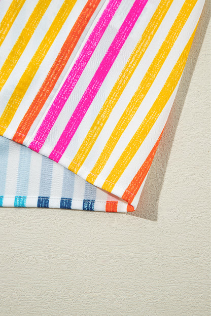 Chemise ample à rayures orange multicolores et épaules tombantes