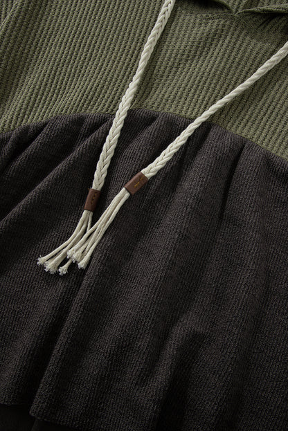 Haut à capuche asymétrique vert laurier à manches larges et textures contrastées