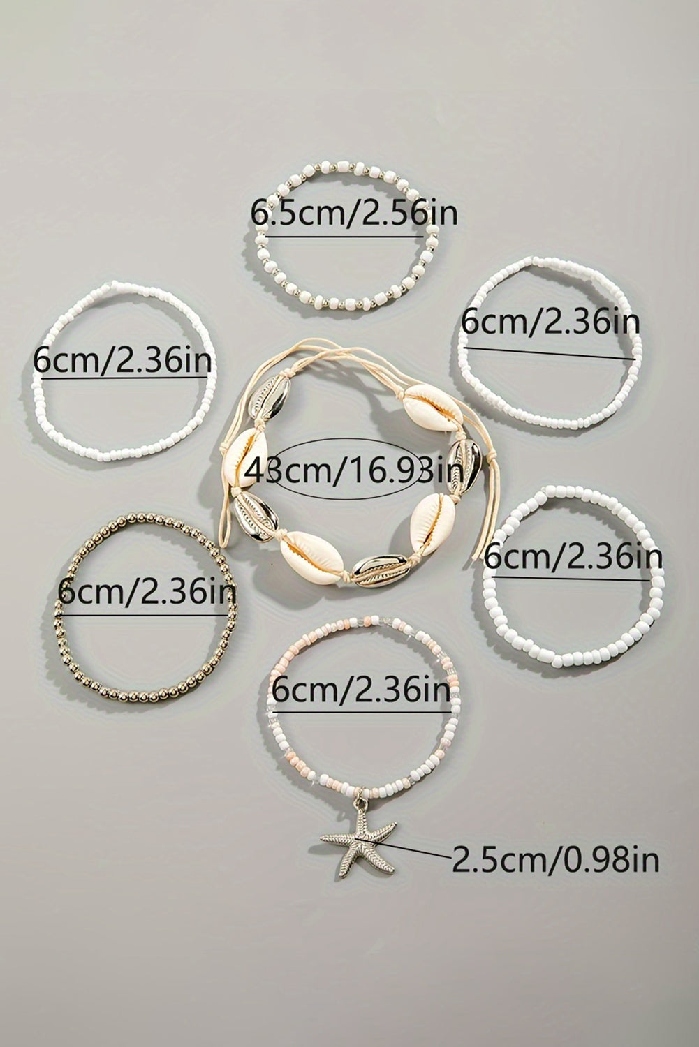 Ensemble de 7 bracelets blancs en perles de coquillages et étoiles de mer
