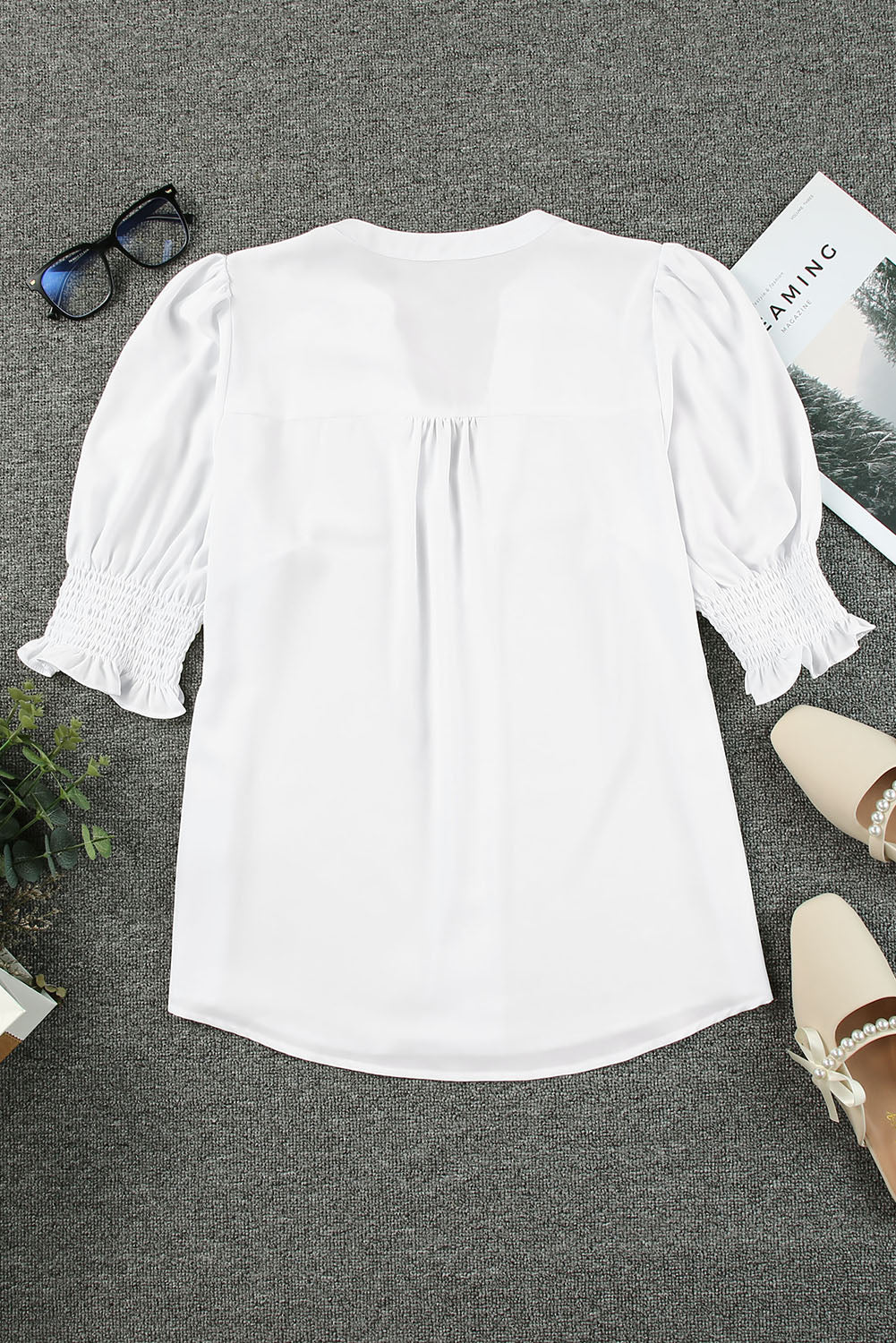 Blusa con cuello en V y media manga de color liso