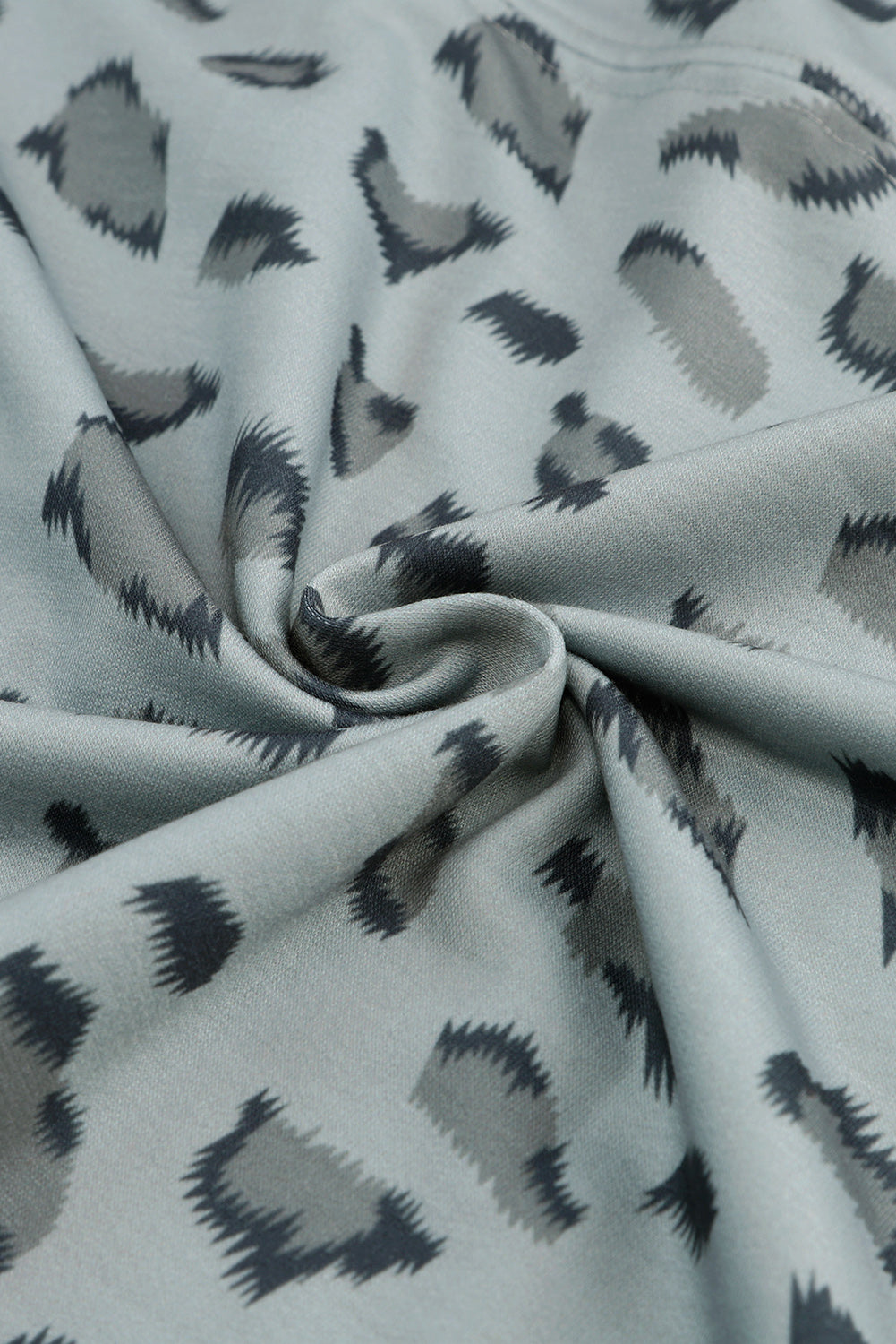 Top holgado de manga larga con costuras y estampado animal marrón