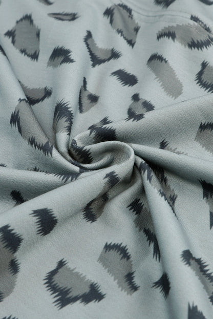 Top holgado de manga larga con costuras y estampado animal marrón