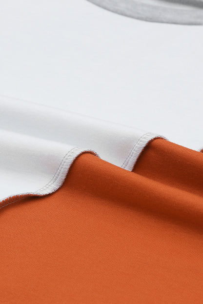 Haut à manches longues et ourlet irrégulier avec coutures colorblock