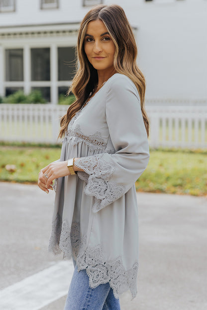 Chemisier à manches cloche et empiècements en crochet