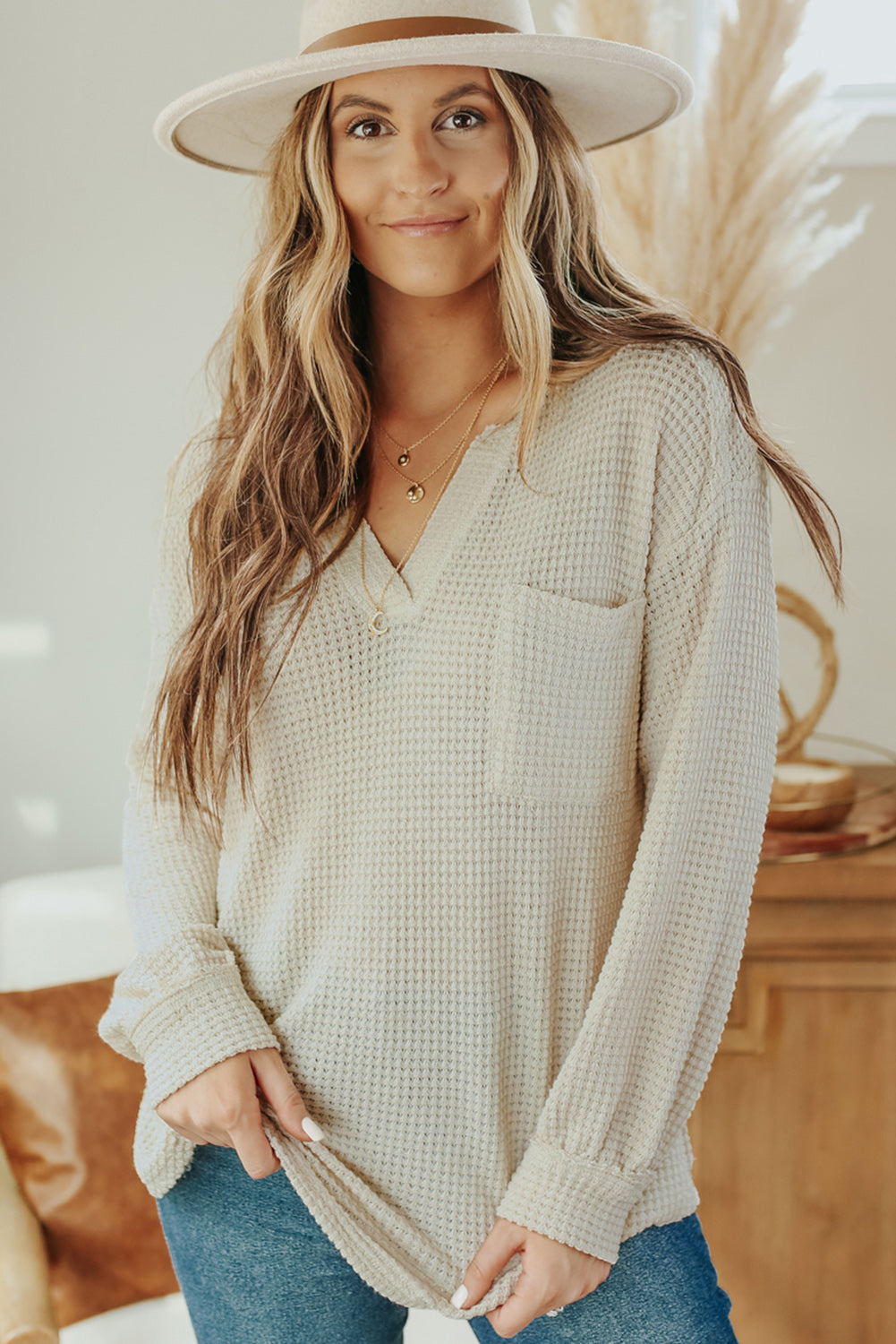 Haut ample en tricot gaufré à col fendu et poches