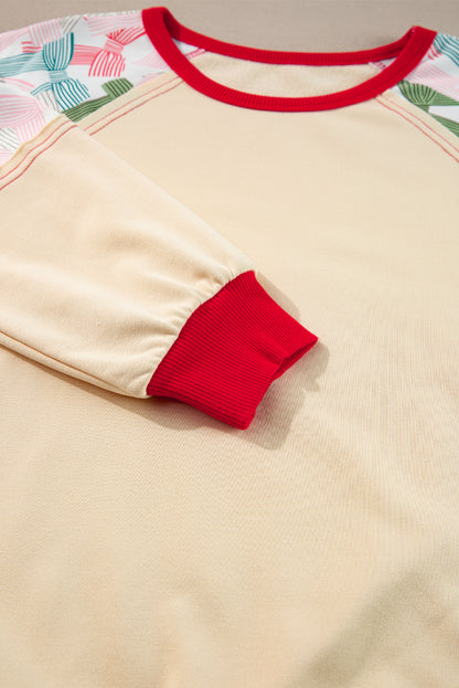 Haut beige à manches raglan et bordures colorblock, imprimé patchwork et nœud papillon