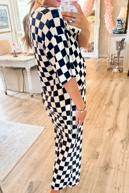 Ensemble tunique à manches courtes et pantalon évasé à carreaux noirs