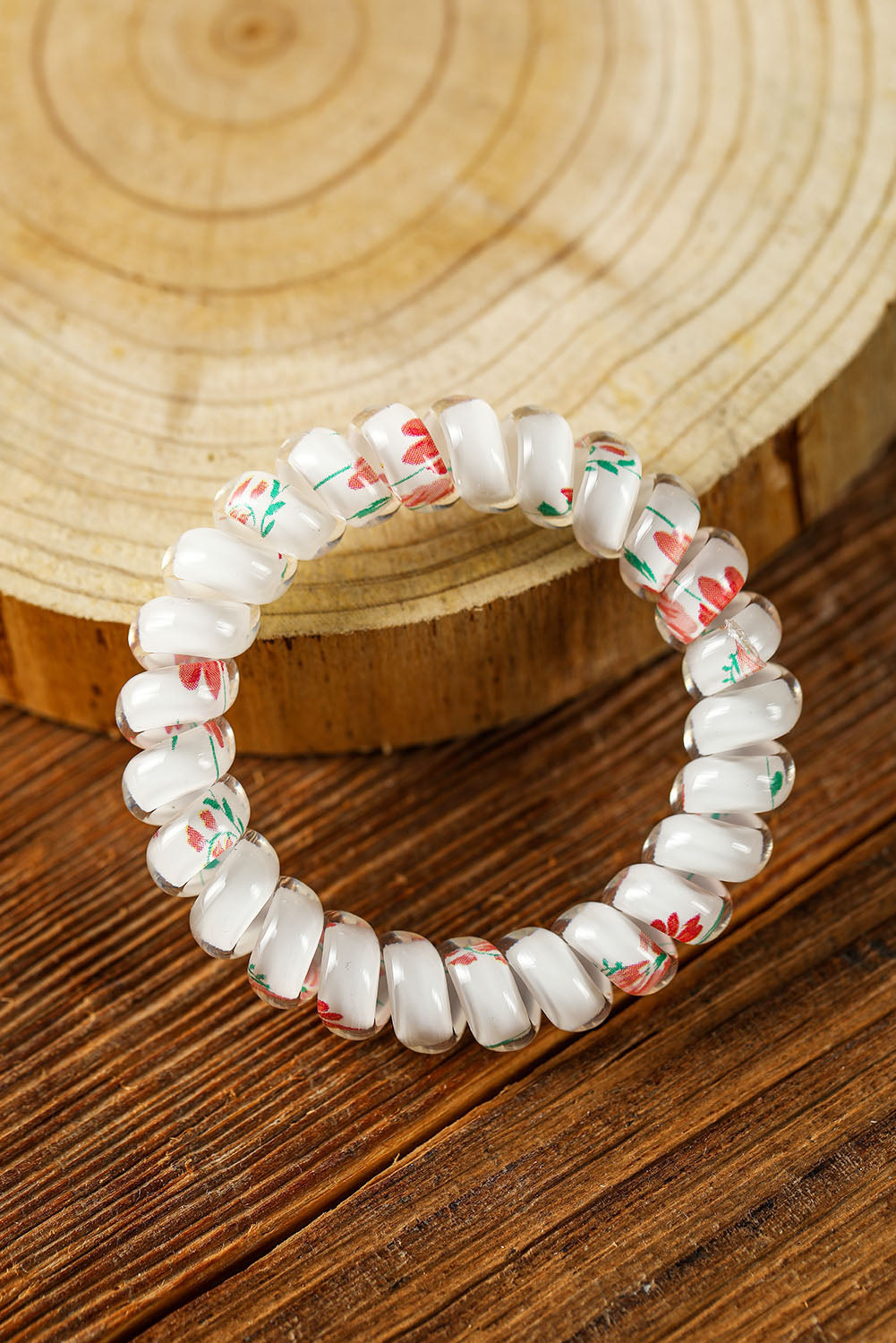 Coletero con cordón para teléfono floral negro