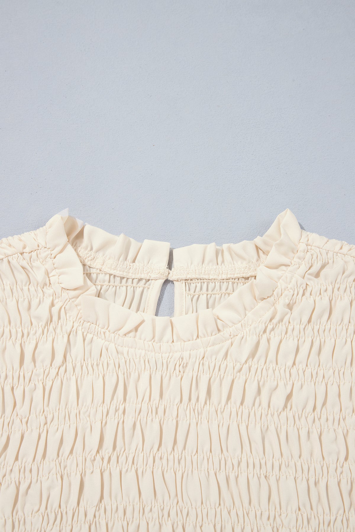 Jet Stream Solid Color Smocked Ruffle Hem Long Sleeve Blouse