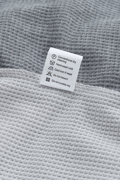 Haut en tricot gaufré à manches contrastées et imprimé léopard sauvage