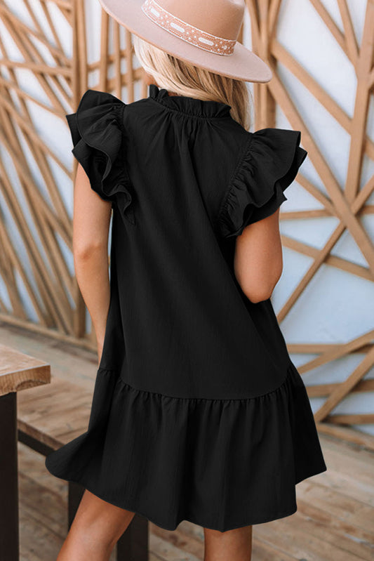 Blusa de manga farol con volantes y bordado floral 