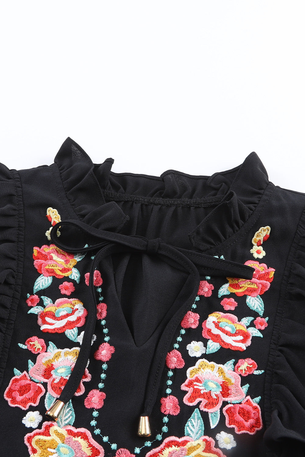 Blusa de manga farol con volantes y bordado floral 