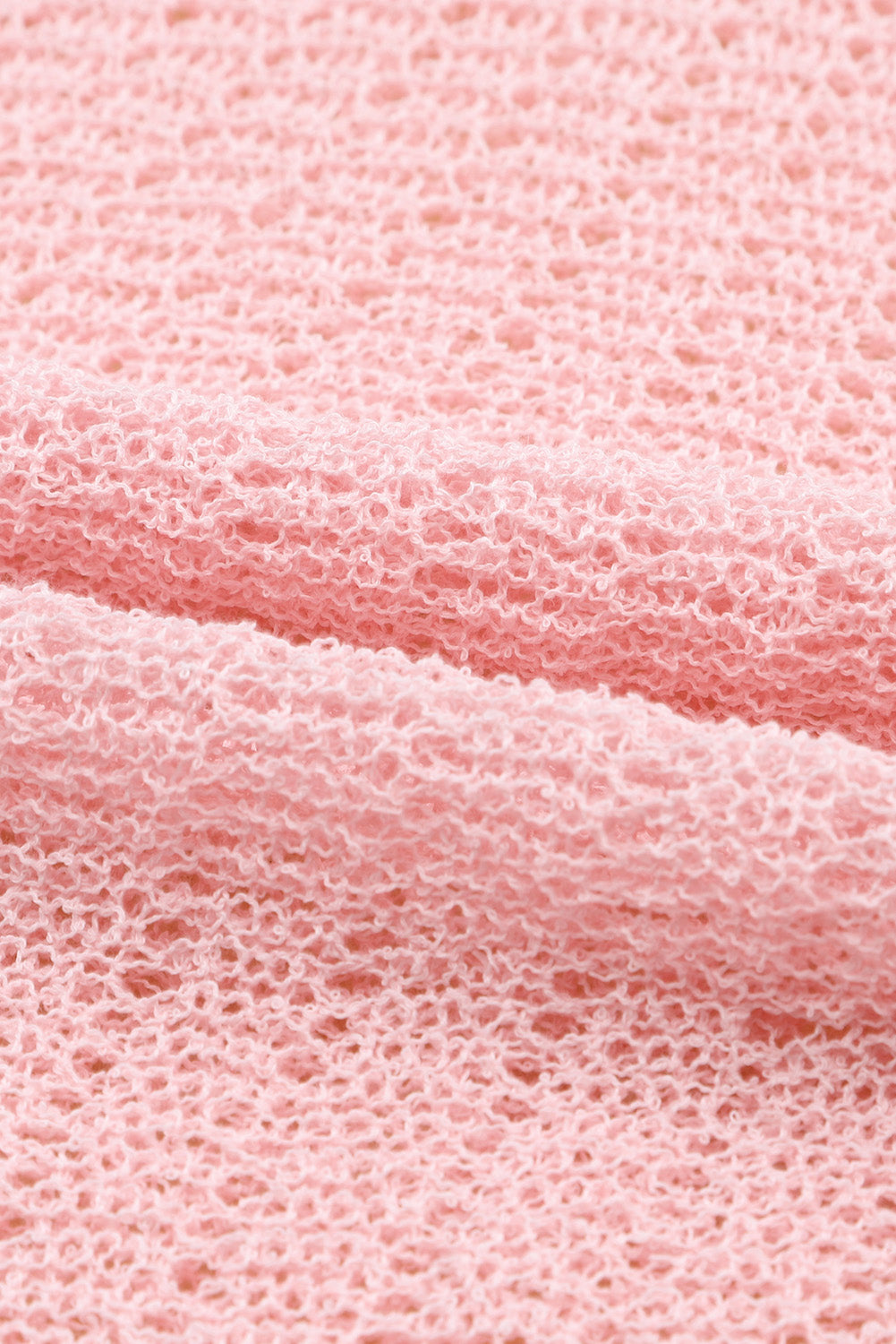 Haut tricoté à manches longues et col rond avec œillets 