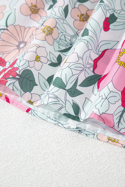 Chemisier à manches courtes à imprimé floral rose et bordure à volants contrastés