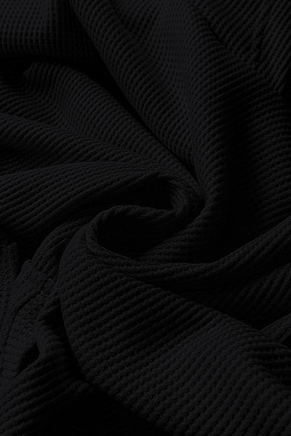 Sweat à capuche surdimensionné noir en tricot gaufré doublé polaire