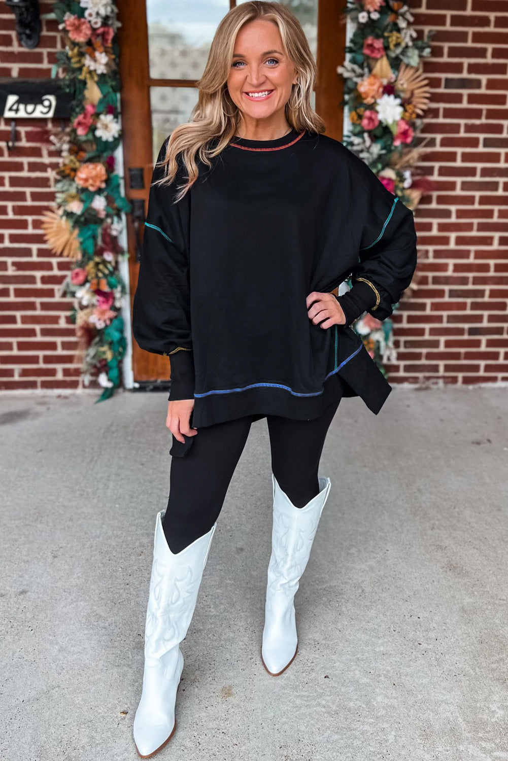 Sweat-shirt ample fendu noir à coutures contrastées
