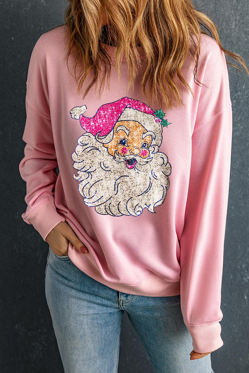 Sweat-shirt rose à épaules tombantes et motif Père Noël audacieux