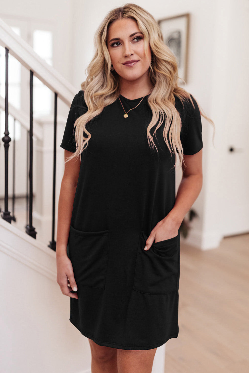 Tunique à manches courtes avec poches latérales 