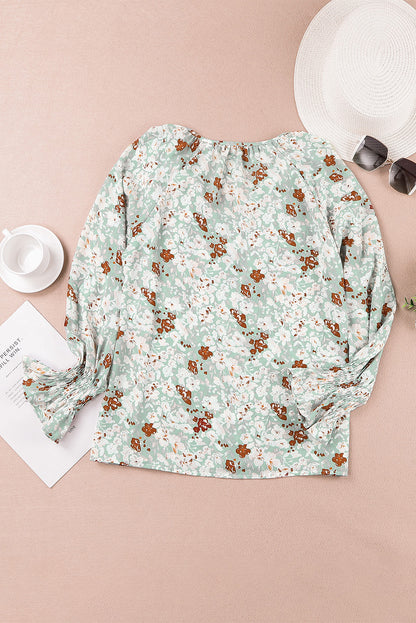 Blusa con botones y cuello en V con estampado floral 