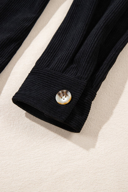 Veste-chemise noire en velours côtelé avec capuche et poches à cordon