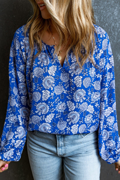 Blusa de manga larga con cuello en V y muesca floral azul 