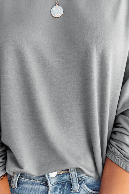 Haut ample à col large et manches chauve-souris 