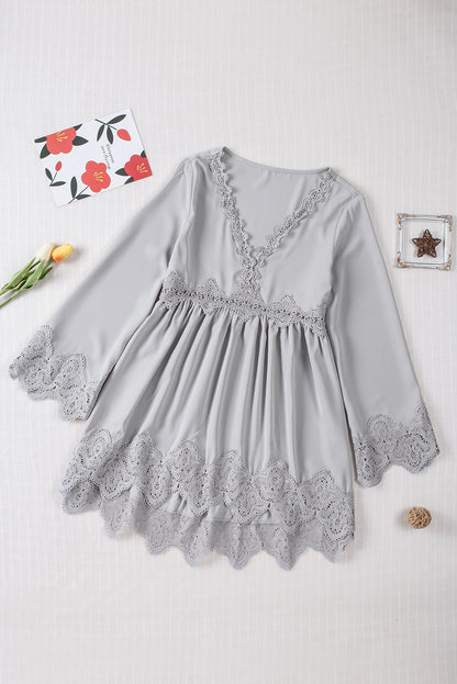 Chemisier à manches cloche et empiècements en crochet