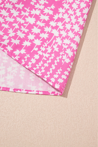 Chemisier rose à imprimé abstrait et bordure Ric Rac, manches flottantes, col en V cranté