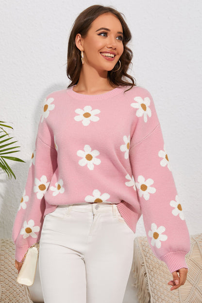 Pull à épaules tombantes et motif floral rose 