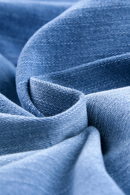 Joggers de mezclilla desgastados con bolsillos