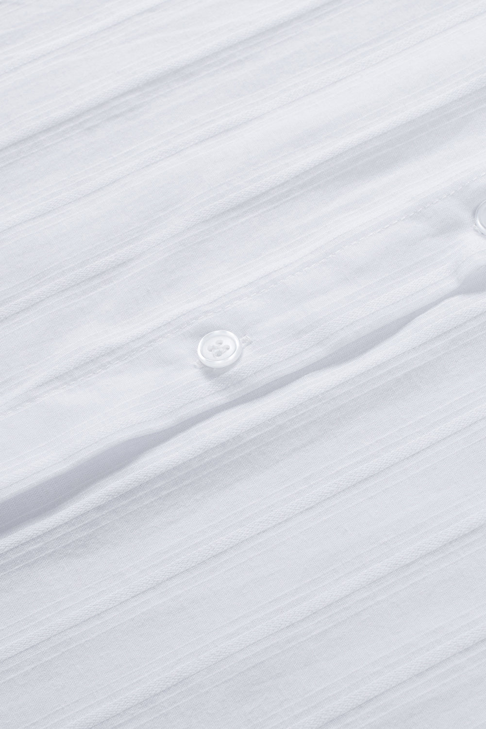 Camisa con botones texturizados y bolsillos